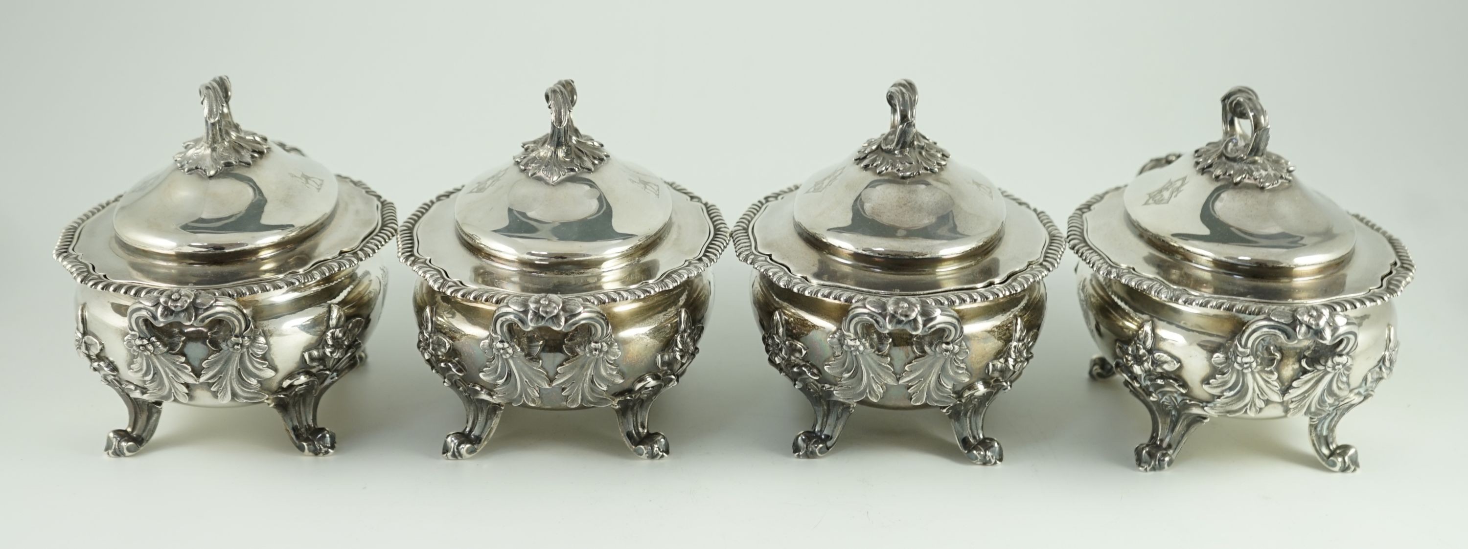 Benacre Hall, Suffolk. A good set of four Victorian silver two handled oval sauce tureens and covers, by Edward & John Barnard